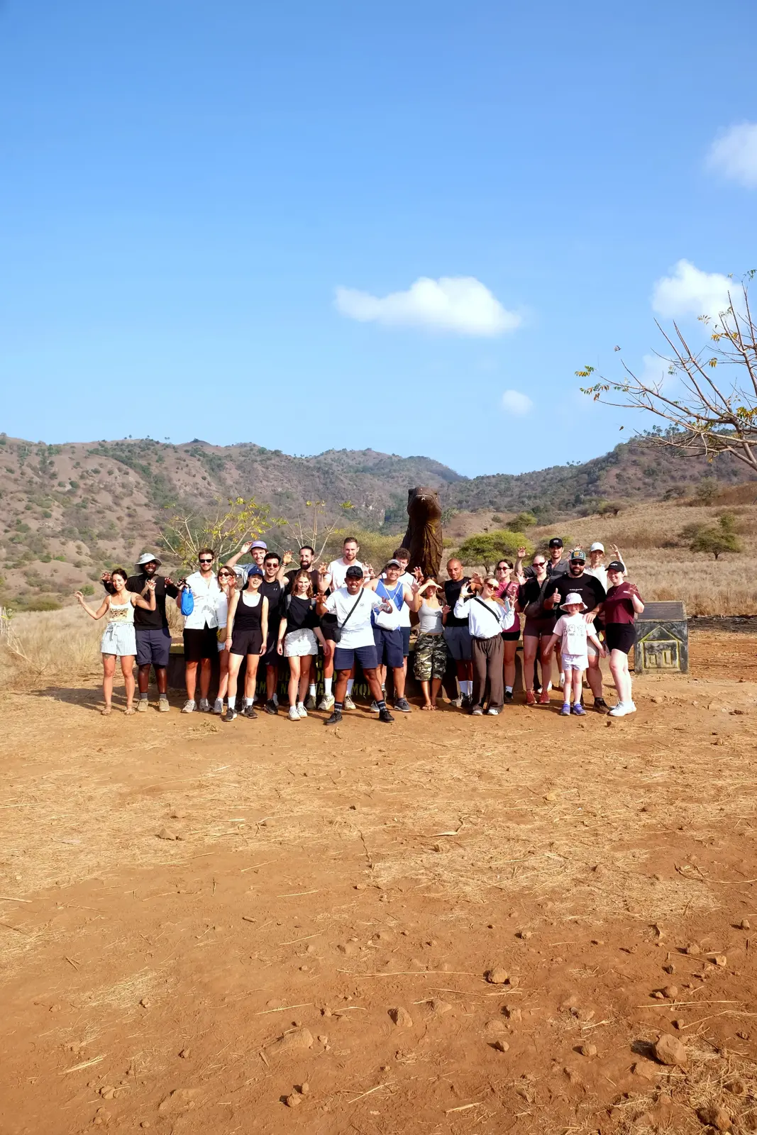 An open trip group photo on Komodo Island